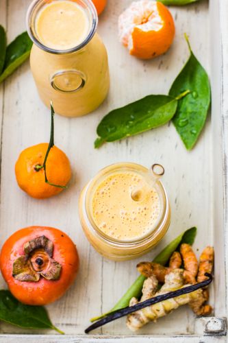 Persimmon and tangerine smoothie with vanilla, ginger and turmeric