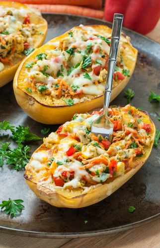 Cheesy pesto chicken and veggie stuffed spaghetti squash