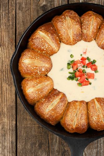 Skillet pretzel rolls with Mexican cheese dip