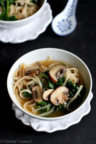 Rice noodle soup with mushrooms and kale