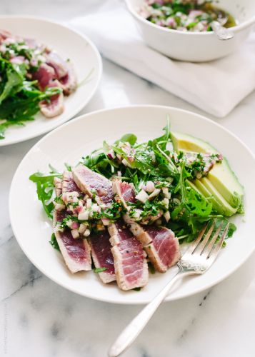 Seared ahi tuna with chimichurri sauce, arugula and avocado