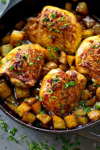 Skillet Honey Garlic Chicken Thighs with Roast Potatoes