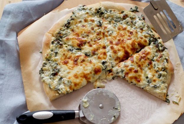 63. Spinach and artichoke pizza