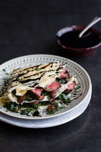 Steak, spinach and mushroom crepes with balsamic glaze