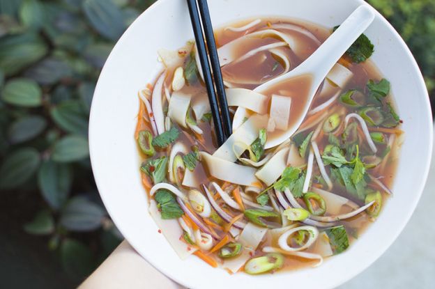 Vegan pho with baked ginger tofu