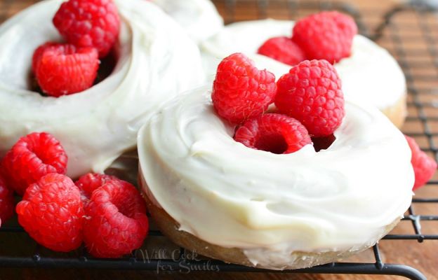 White chocolate covered baked raspberry donuts