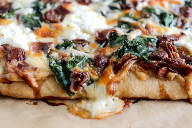 White pizza with spinach and bacon